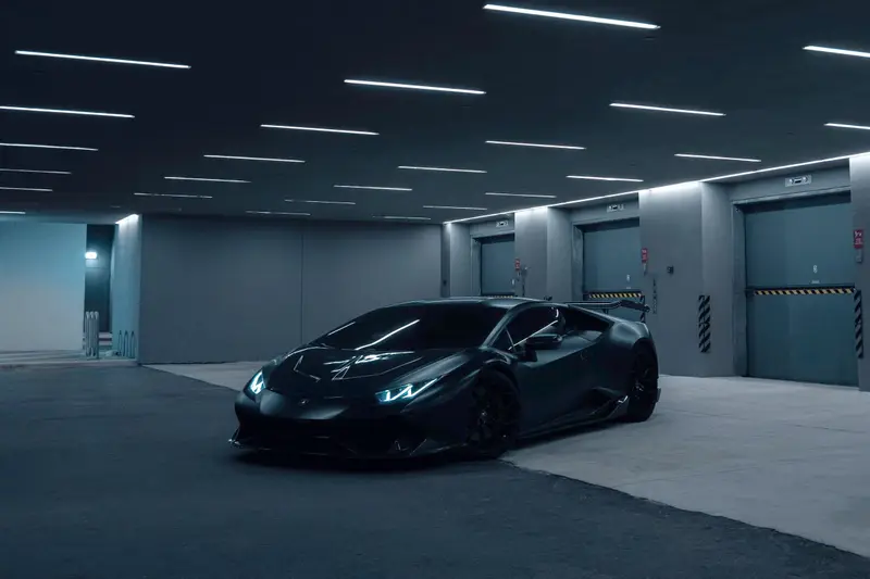 Black Lamborghini Huracán in a Miami garage
